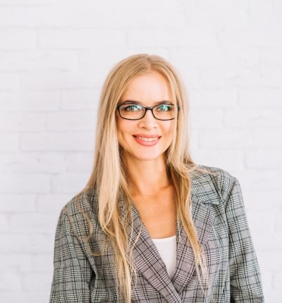 stylish-businesswoman-with-glasses-1-scaled.jpg